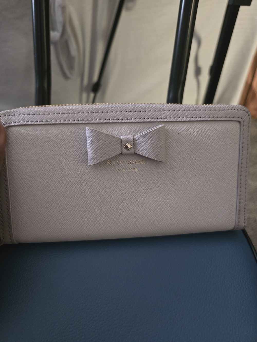 kate spade light pink bow zip-around wallet